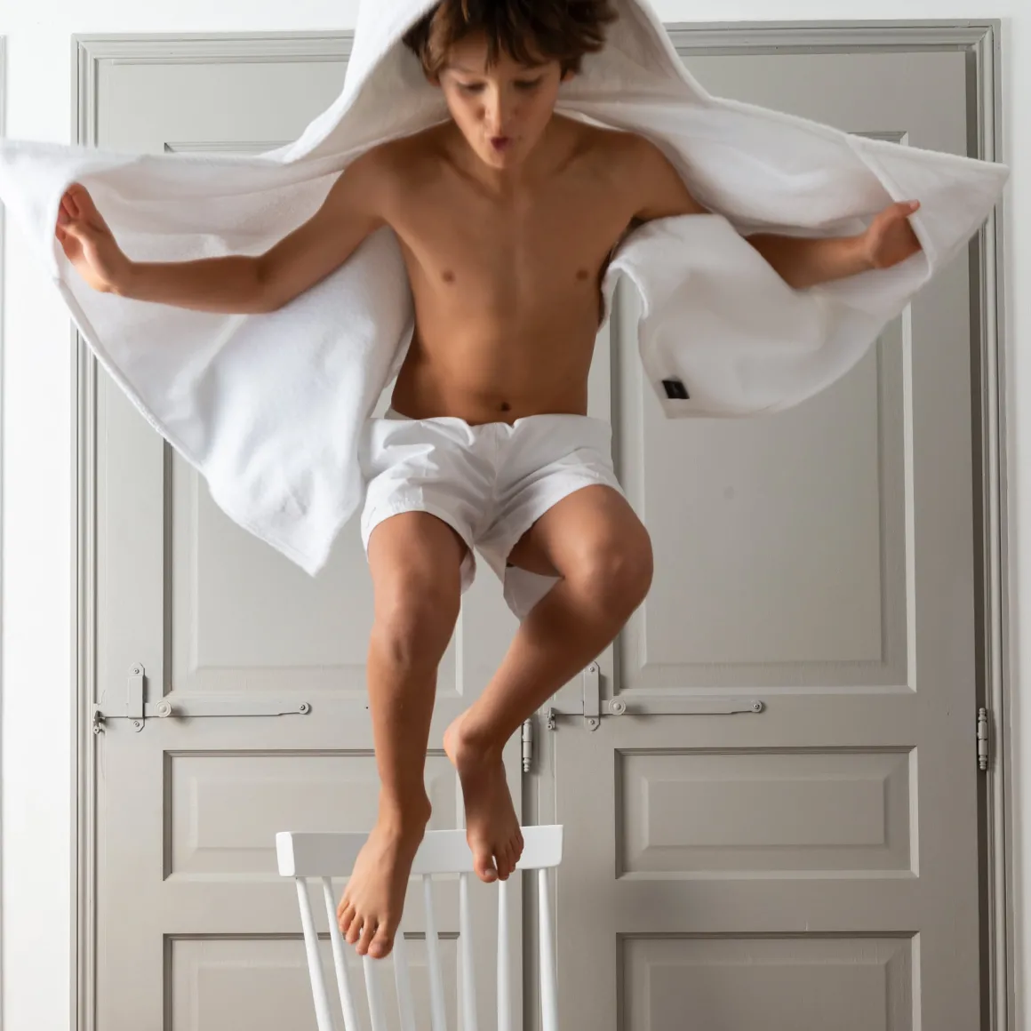 drap_de_bain__capuche_enfant_carr_blanc_x_rolandgarros__blanc_2.webp Roland-Garros Linge De Bain | Accessoires-Drap de bain à capuche enfant Carré Blanc x - Blanc