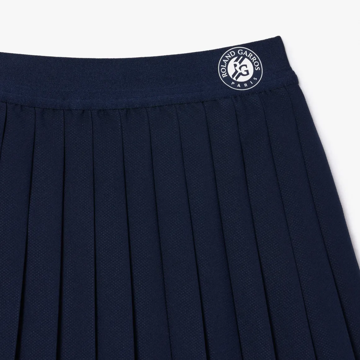 jupe_ramasseuse_de_balle_lacoste_x_rolandgarros__marine_3.webp Roland-Garros Tenues De Ramasseurs De Balles | Bas-Jupe ramasseuse de balle Lacoste x - Marine