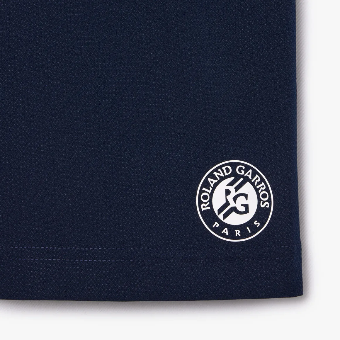 short_ramasseur_garon_lacoste_x_rolandgarros__marine_4.webp Roland-Garros Tenues De Ramasseurs De Balles | Bas-Short Ramasseur garçon Lacoste x - Marine